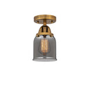 Bell Semi-Flush Mount shown in the Brushed Brass finish with a Plated Smoke shade