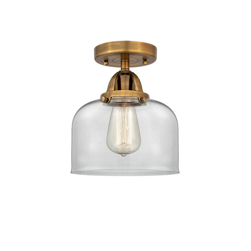 Bell Semi-Flush Mount shown in the Brushed Brass finish with a Clear shade