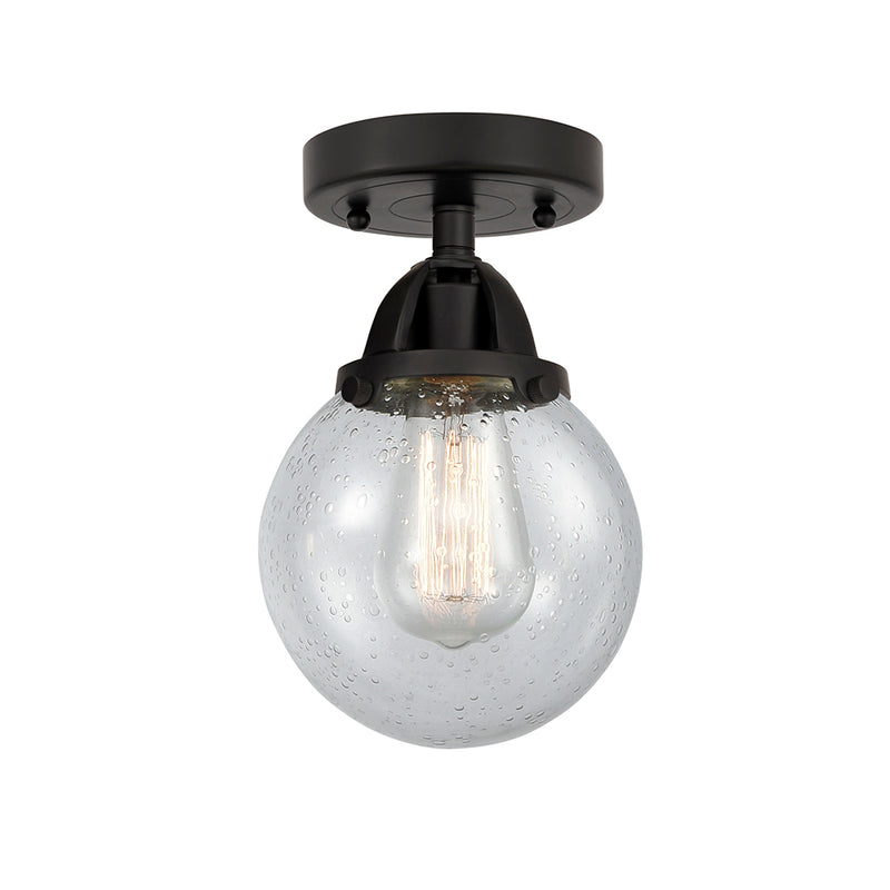 Beacon Semi-Flush Mount shown in the Matte Black finish with a Seedy shade