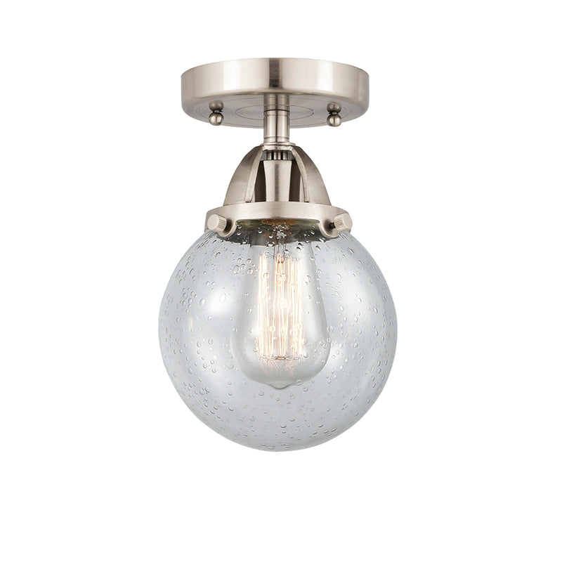 Beacon Semi-Flush Mount shown in the Brushed Satin Nickel finish with a Seedy shade