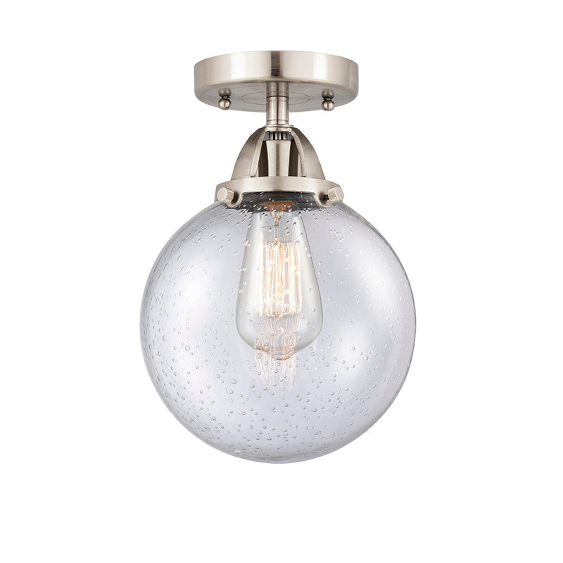 Beacon Semi-Flush Mount shown in the Brushed Satin Nickel finish with a Seedy shade