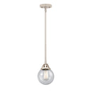 Beacon Mini Pendant shown in the Polished Nickel finish with a Seedy shade