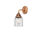 Bell Sconce shown in the Antique Copper finish with a Clear shade