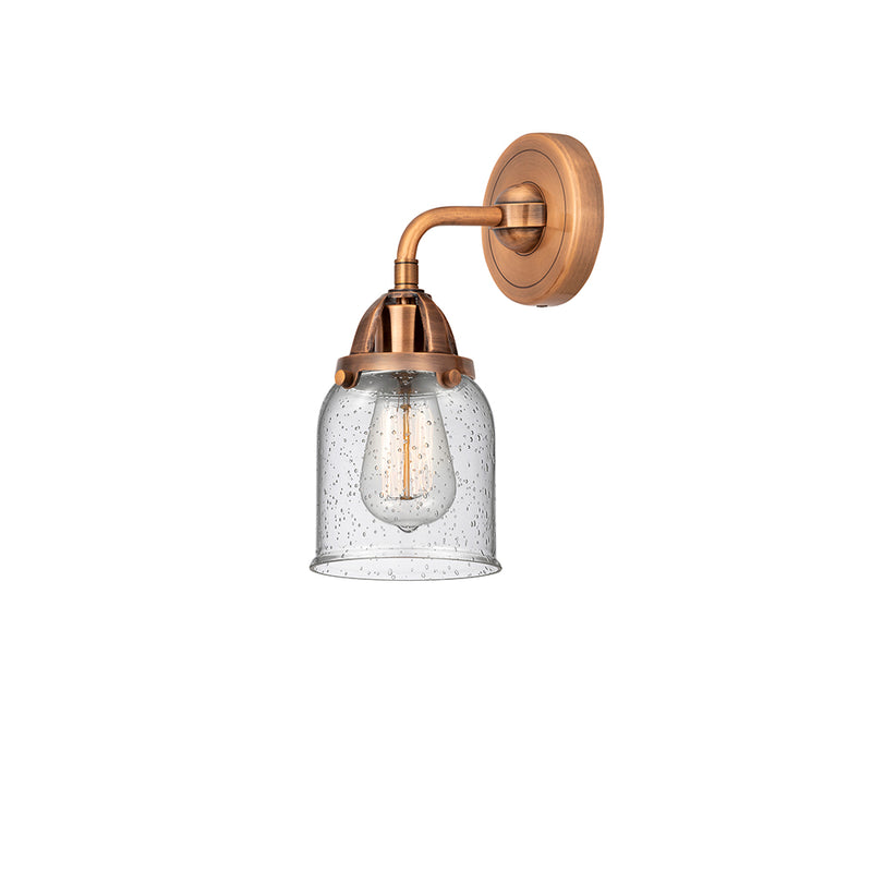 Bell Sconce shown in the Antique Copper finish with a Seedy shade