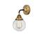 Beacon Sconce shown in the Black Antique Brass finish with a Clear shade