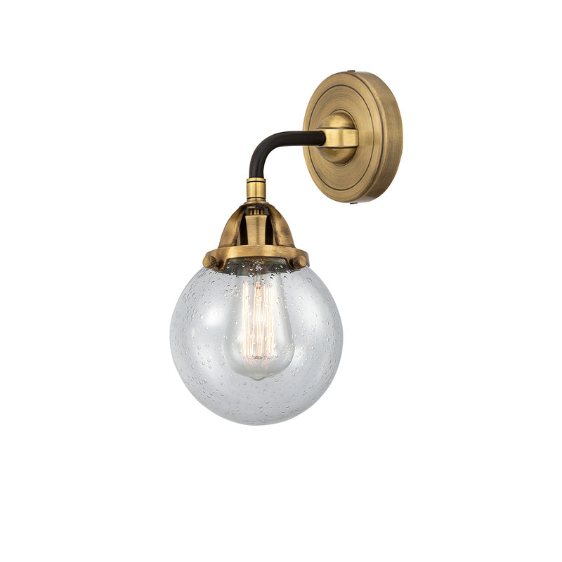 Beacon Sconce shown in the Black Antique Brass finish with a Seedy shade