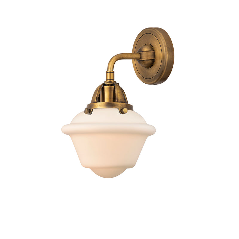 Oxford Sconce shown in the Brushed Brass finish with a Matte White shade