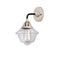 Oxford Sconce shown in the Black Polished Nickel finish with a Clear shade