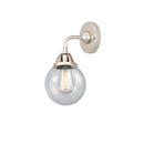 Beacon Sconce shown in the Polished Nickel finish with a Seedy shade