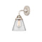 Cone Sconce shown in the Polished Nickel finish with a Clear shade