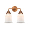 Canton Bath Vanity Light shown in the Antique Copper finish with a Matte White shade