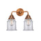 Canton Bath Vanity Light shown in the Antique Copper finish with a Clear shade