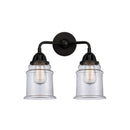 Canton Bath Vanity Light shown in the Matte Black finish with a Clear shade