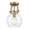 Newton Sphere Flush Mount shown in the Brushed Brass finish with a Clear shade