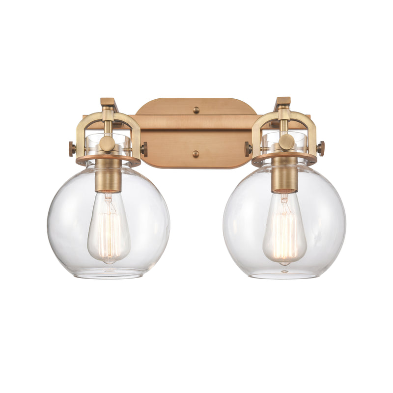 Newton Sphere Bath Vanity Light shown in the Brushed Brass finish with a Clear shade