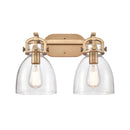 Newton Bell Bath Vanity Light shown in the Brushed Brass finish with a Clear shade