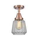 Chatham Flush Mount shown in the Antique Copper finish with a Clear shade