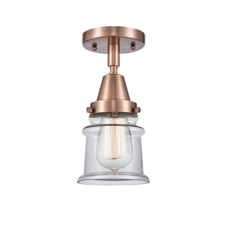 Canton Flush Mount shown in the Antique Copper finish with a Clear shade