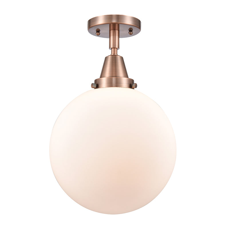 Beacon Flush Mount shown in the Antique Copper finish with a Matte White shade