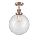 Beacon Flush Mount shown in the Antique Copper finish with a Clear shade