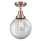 Beacon Flush Mount shown in the Antique Copper finish with a Clear shade