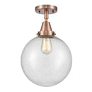 Beacon Flush Mount shown in the Antique Copper finish with a Seedy shade