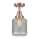 Stanton Flush Mount shown in the Antique Copper finish with a Clear Wire Mesh shade