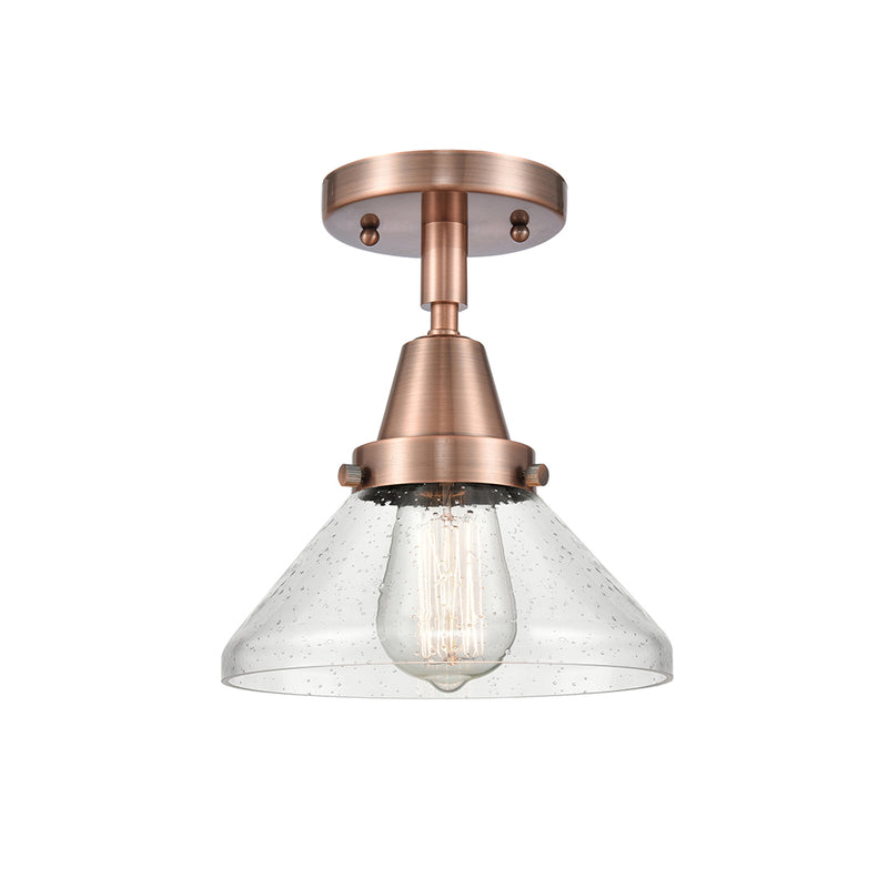 Caden Flush Mount shown in the Antique Copper finish with a Seedy shade