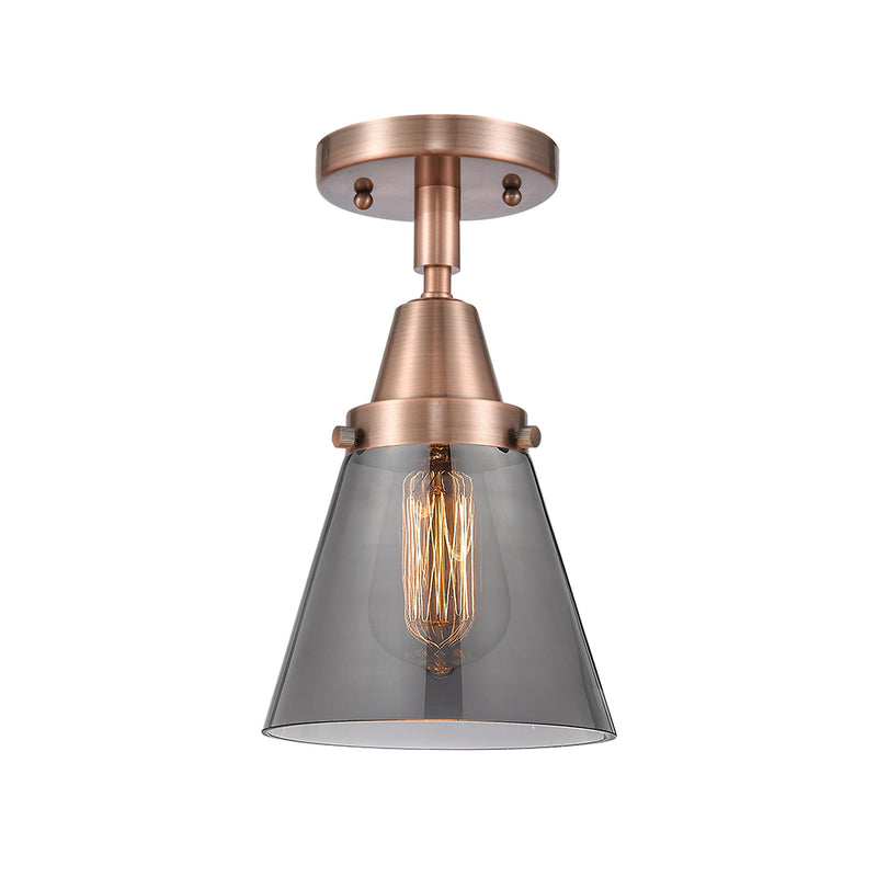 Cone Flush Mount shown in the Antique Copper finish with a Plated Smoke shade