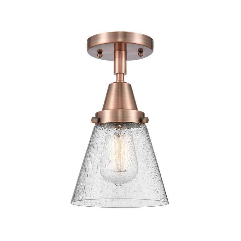 Cone Flush Mount shown in the Antique Copper finish with a Seedy shade