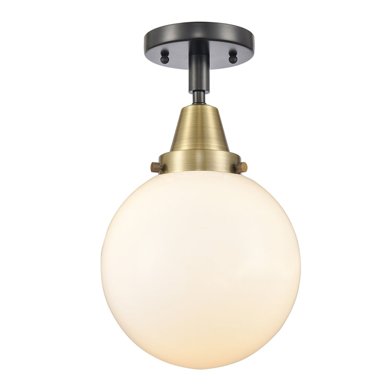 Beacon Flush Mount shown in the Black Antique Brass finish with a Matte White shade