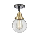 Beacon Flush Mount shown in the Black Antique Brass finish with a Clear shade