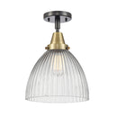 Seneca Falls Flush Mount shown in the Black Antique Brass finish with a Clear Halophane shade