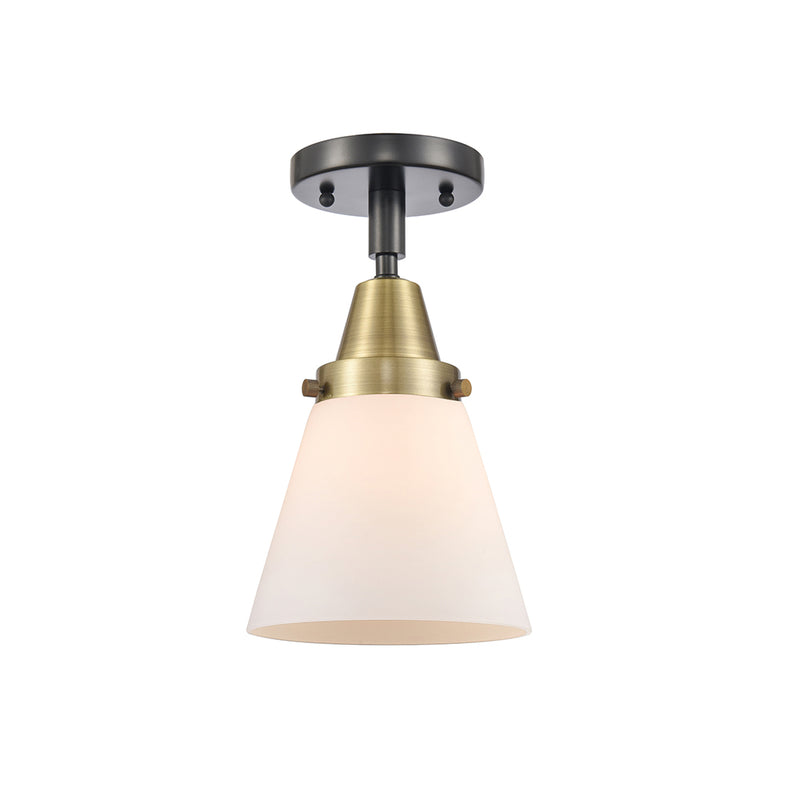 Cone Flush Mount shown in the Black Antique Brass finish with a Matte White shade