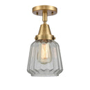 Chatham Flush Mount shown in the Brushed Brass finish with a Clear shade