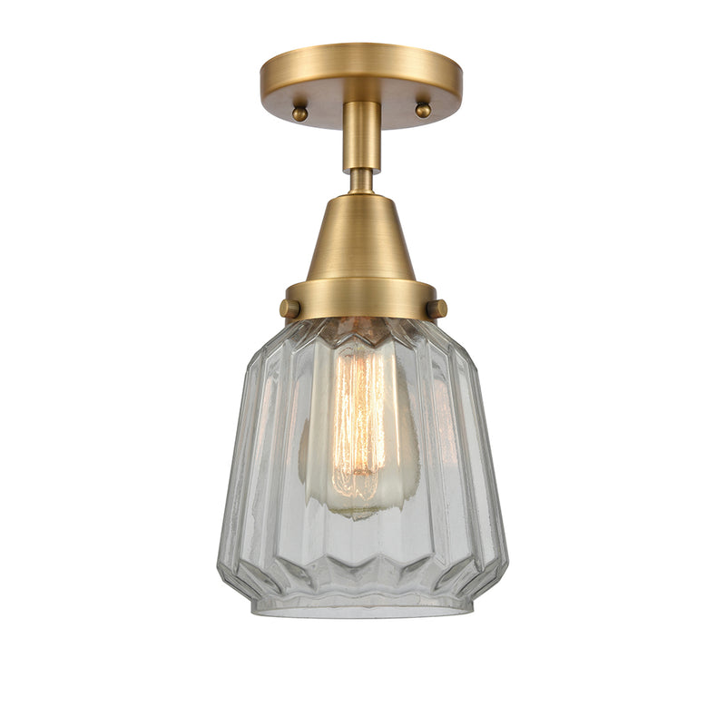 Chatham Flush Mount shown in the Brushed Brass finish with a Clear shade