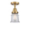 Canton Flush Mount shown in the Brushed Brass finish with a Clear shade