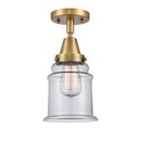 Canton Flush Mount shown in the Brushed Brass finish with a Clear shade