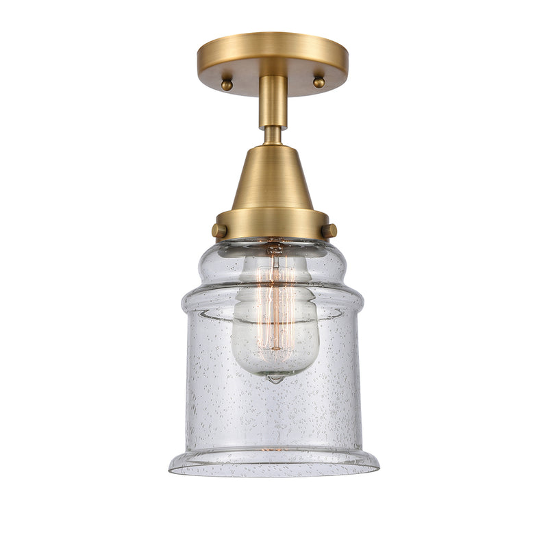 Canton Flush Mount shown in the Brushed Brass finish with a Seedy shade