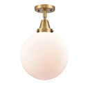 Beacon Flush Mount shown in the Brushed Brass finish with a Matte White shade