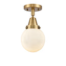 Beacon Flush Mount shown in the Brushed Brass finish with a Matte White shade