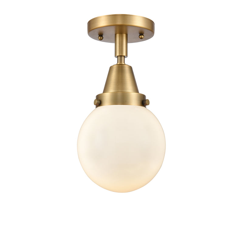 Beacon Flush Mount shown in the Brushed Brass finish with a Matte White shade