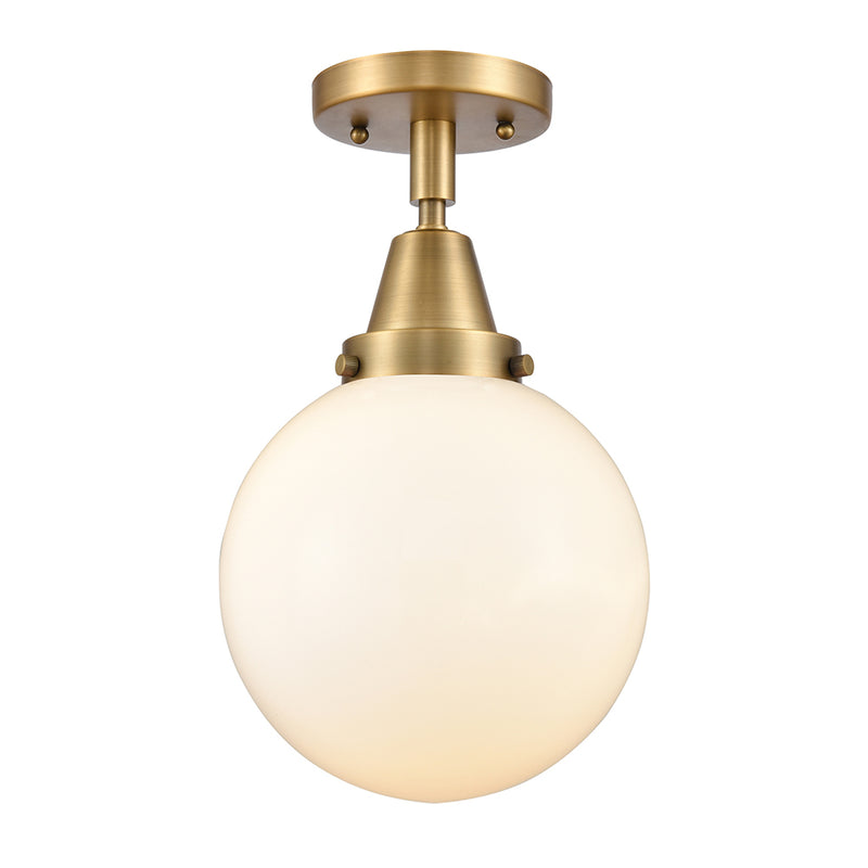 Beacon Flush Mount shown in the Brushed Brass finish with a Matte White shade