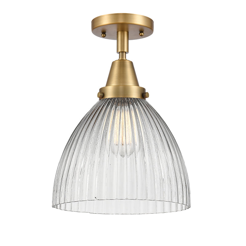 Seneca Falls Flush Mount shown in the Brushed Brass finish with a Clear Halophane shade