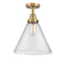 Cone Flush Mount shown in the Brushed Brass finish with a Seedy shade