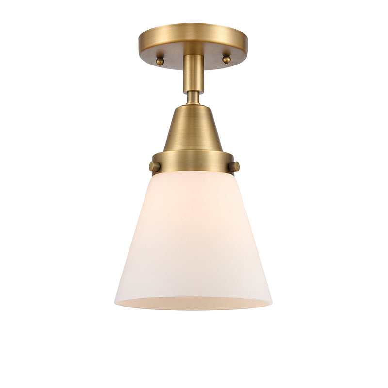 Cone Flush Mount shown in the Brushed Brass finish with a Matte White shade