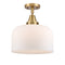 Bell Flush Mount shown in the Brushed Brass finish with a Matte White shade
