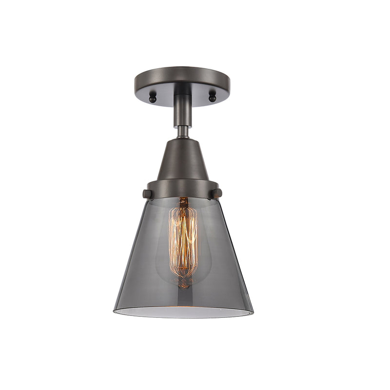 Cone Flush Mount shown in the Oil Rubbed Bronze finish with a Plated Smoke shade