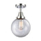 Beacon Flush Mount shown in the Polished Chrome finish with a Clear shade