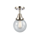 Beacon Flush Mount shown in the Polished Nickel finish with a Seedy shade